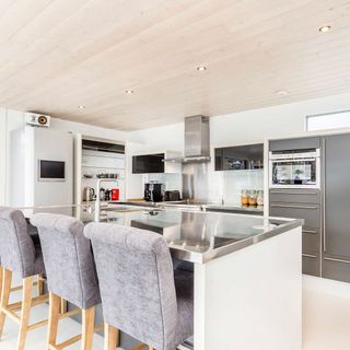 kitchen with cabinets and chair