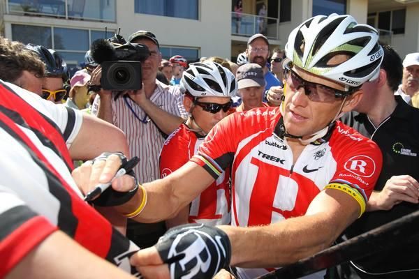 Lance Armstrong signs autographs at the Twitter ride.