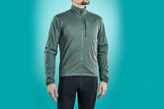 Male cyclist wearing the Pearl Izumi Pro Insulated Jacket