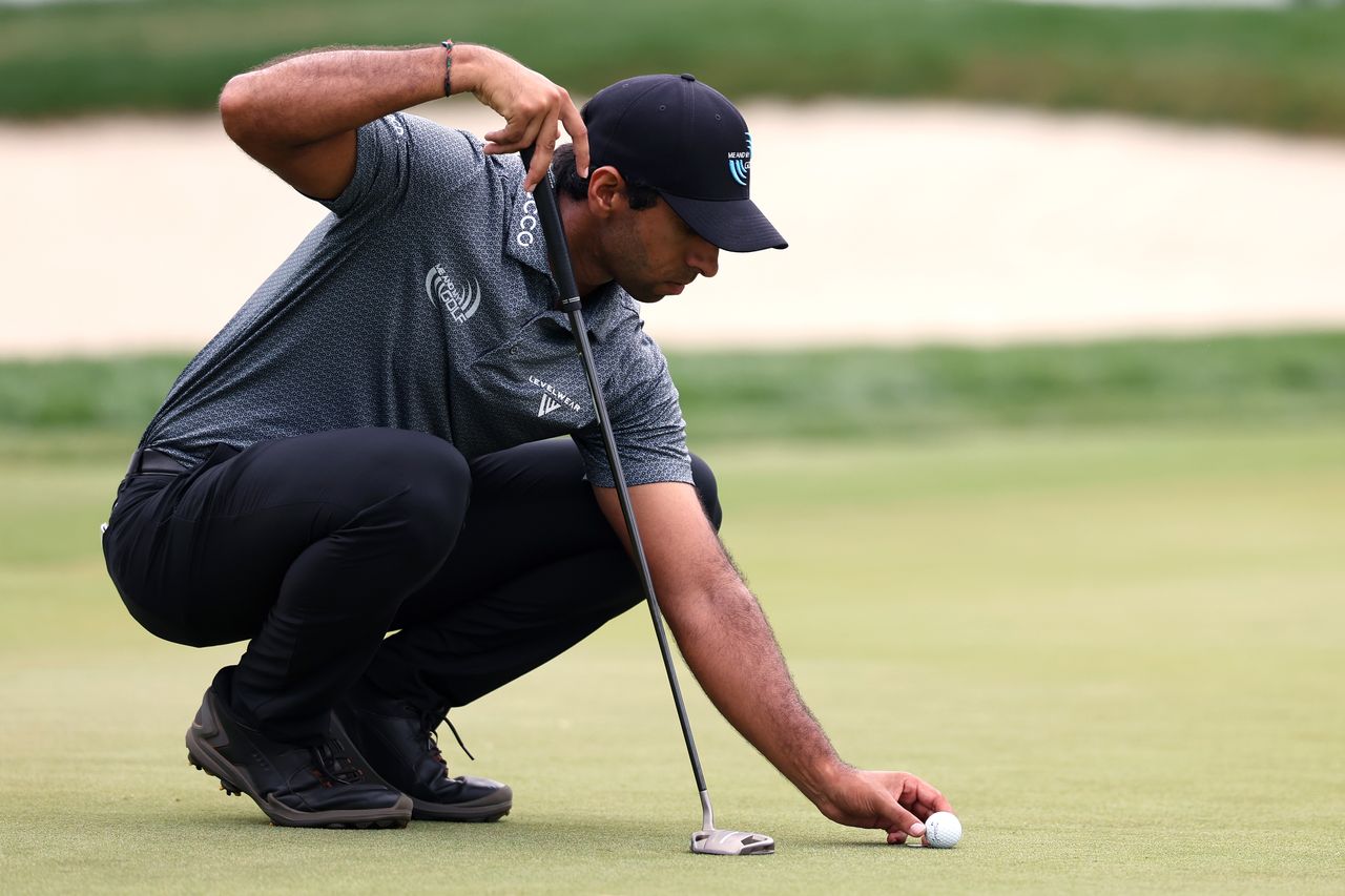Aaron Rai lines up a putt on the 18th green during the third round of the ONEflight Myrtle Beach Classic