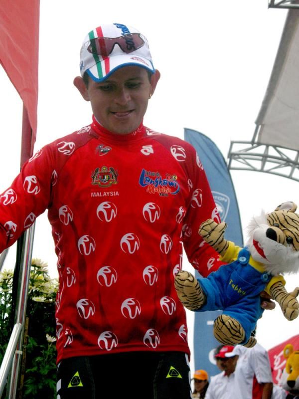 Rujano also pulled on the red climber's jersey