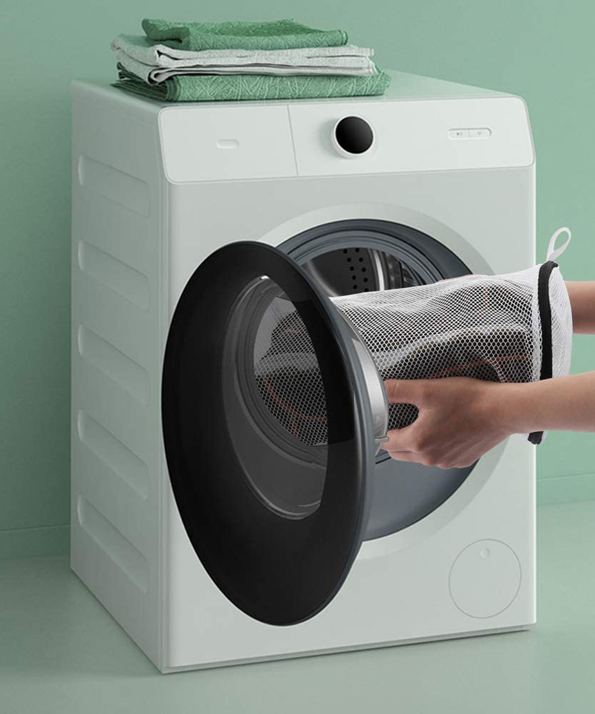 sneakers in a mesh bag loaded into a washing machine - amazon