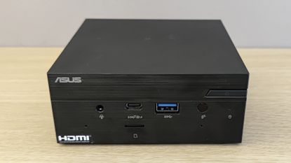 The Asus PN51 MiniPC on a desk