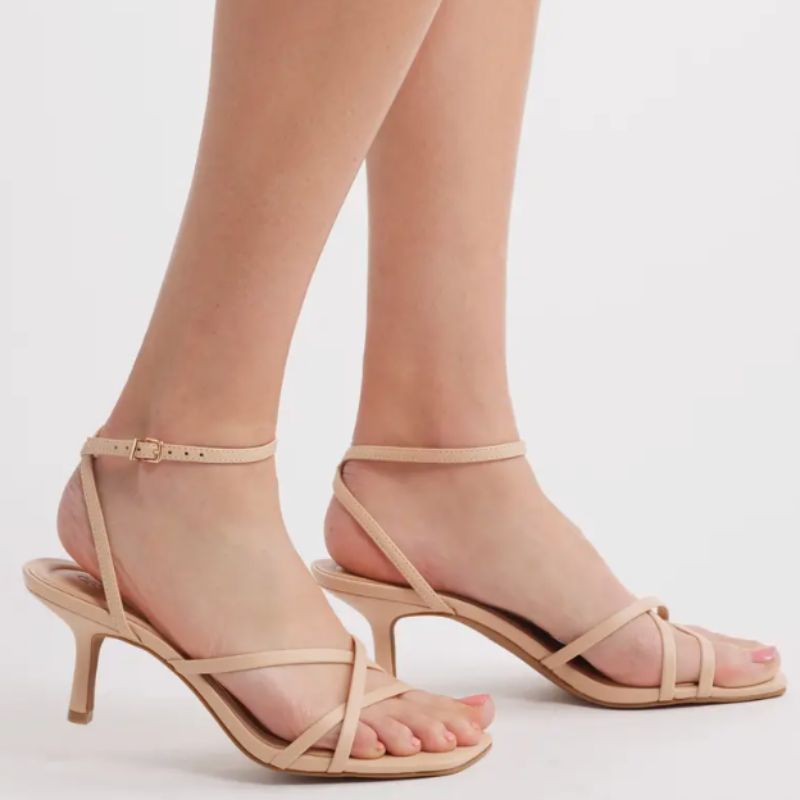 nude kitten heels with open toes and a criss-crossed strap design
