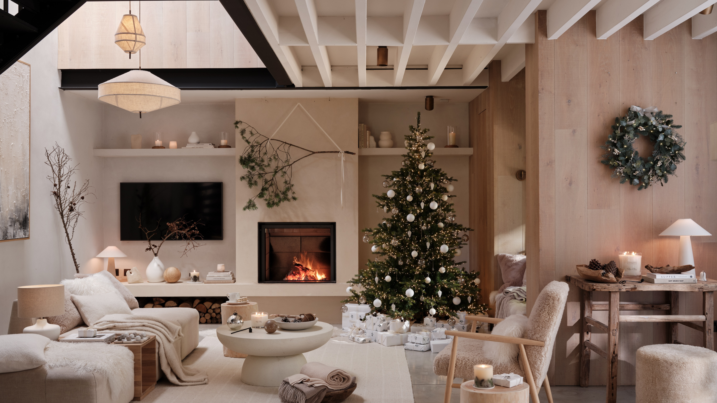 beige and cream living room ready for christmas.