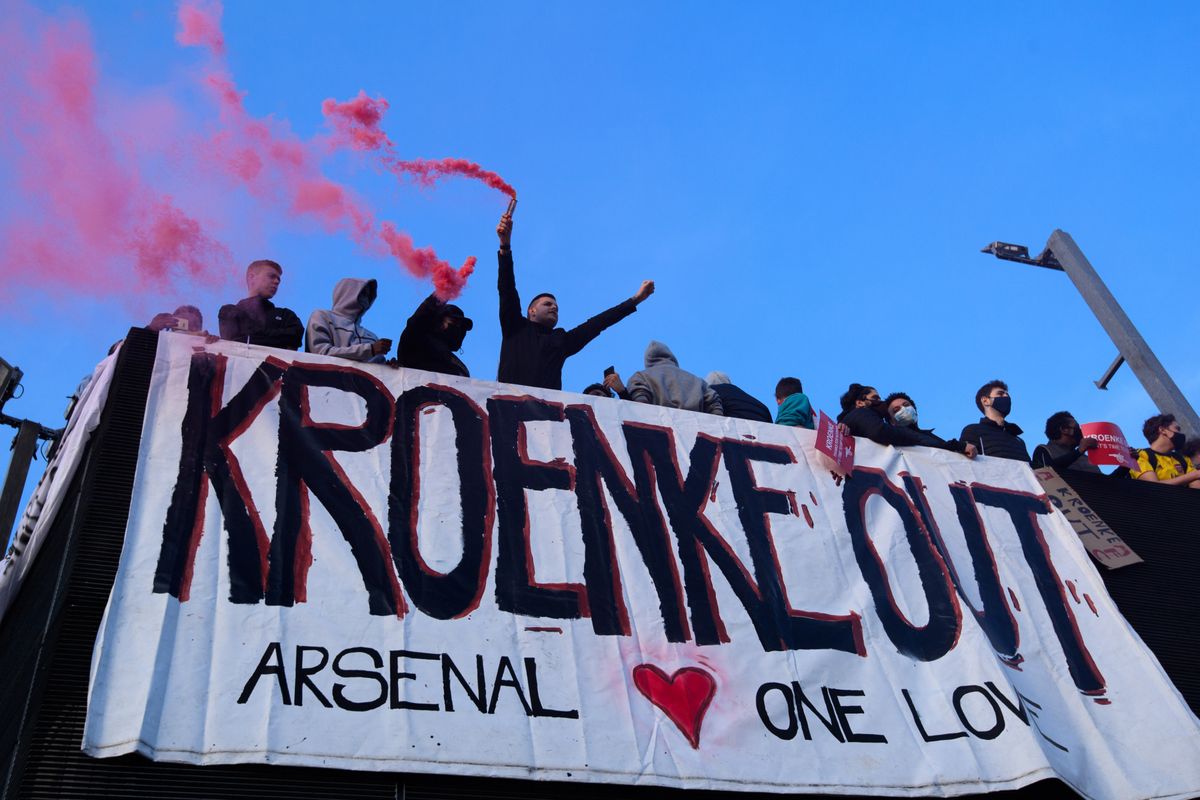 Arsenal fans protest against owner Stan Kroenke outside the Emirates Stadium