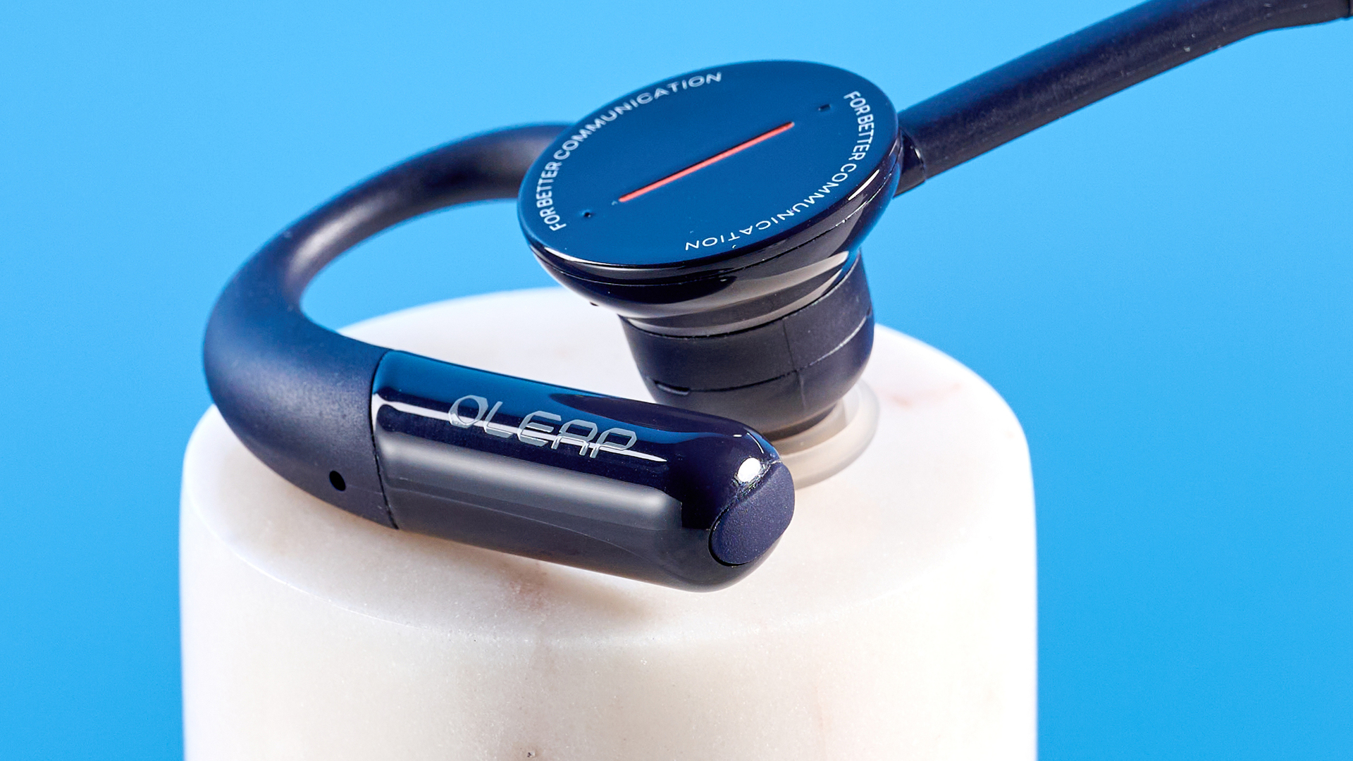 Oleap Archer AI Meeting Headset photographed in front of a blue background.
