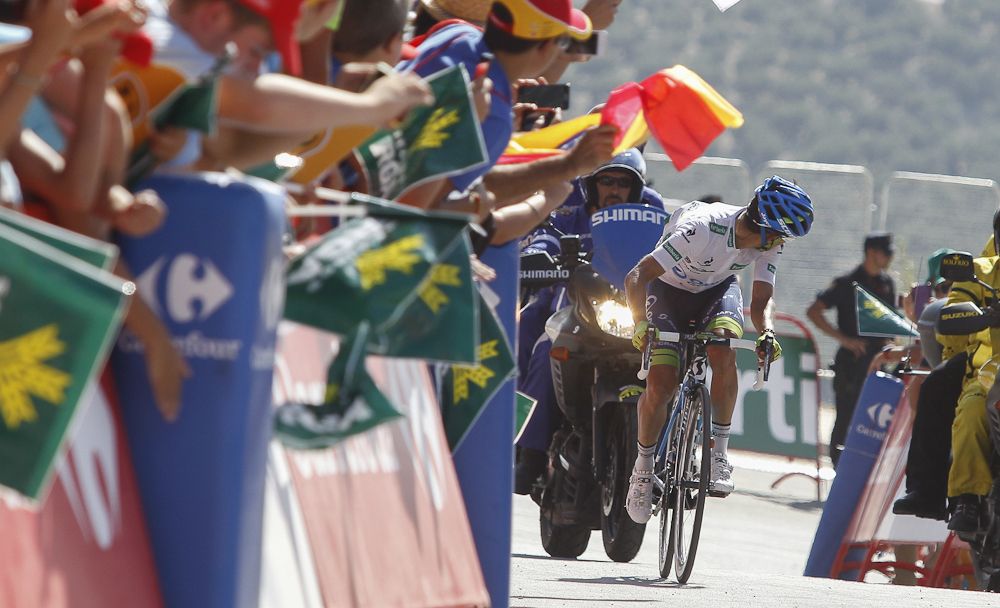 Estaban Chaves looks behind as he makes his way to the finish of stage 6 at the 2015 Vuelta a Espana.