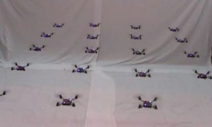 Mini-helicopter robots fly in formation: Researchers hope these machines could one day serve as surveillance bots.
