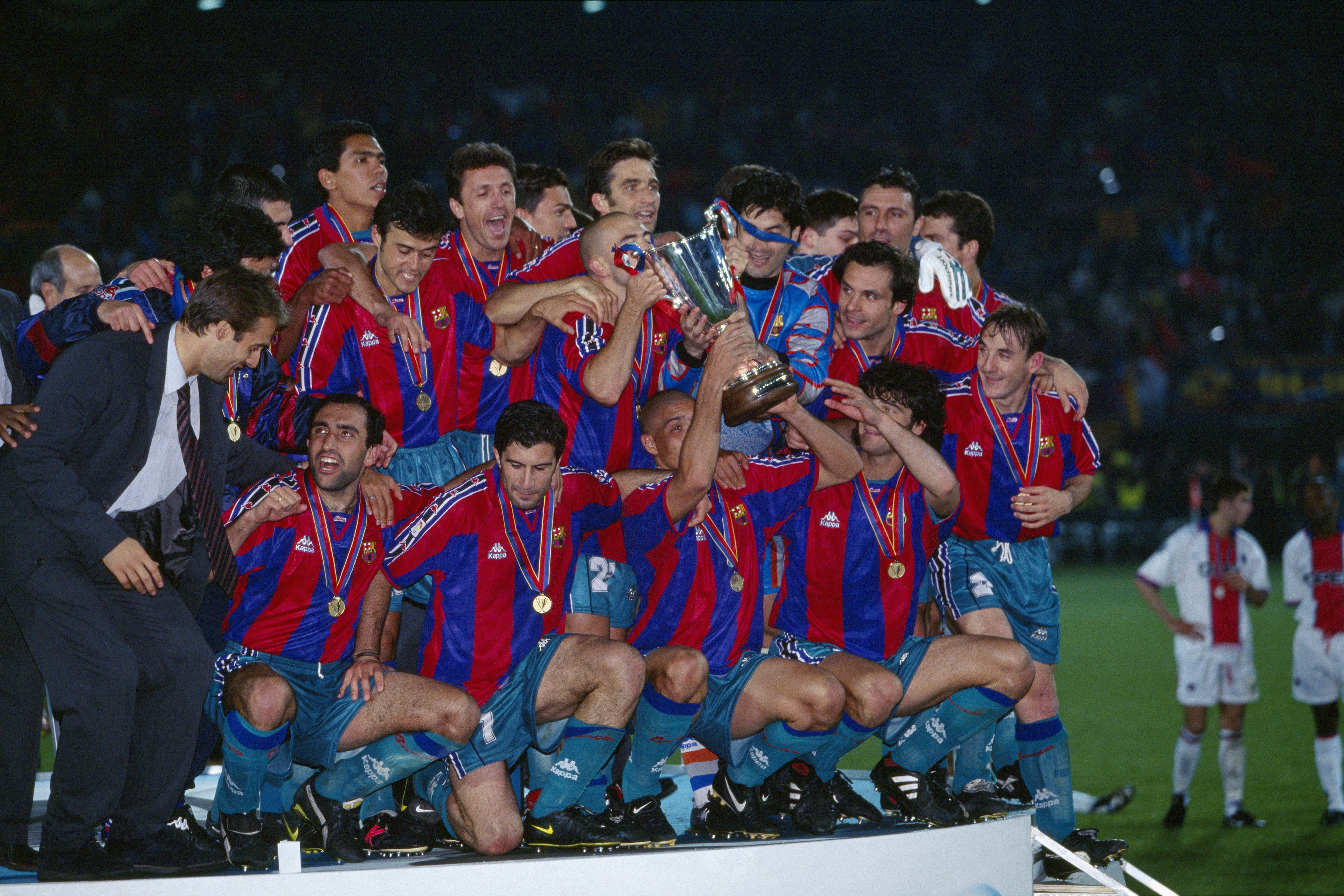 Barcelona players celebrate with the trophy after victory over Paris Saint-Germain in the UEFA Cup Winners' Cup final in May 1997.