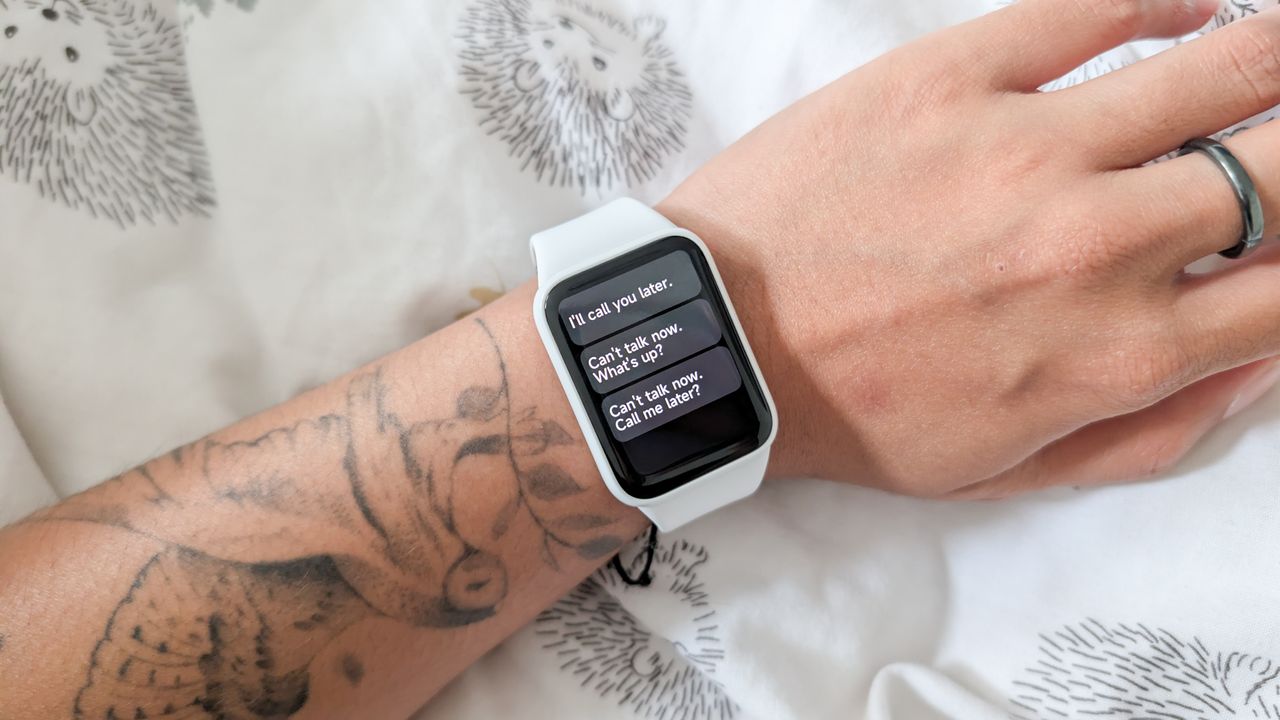 A person wearing a Xiaomi Smart Band 10 Pro smartwatch