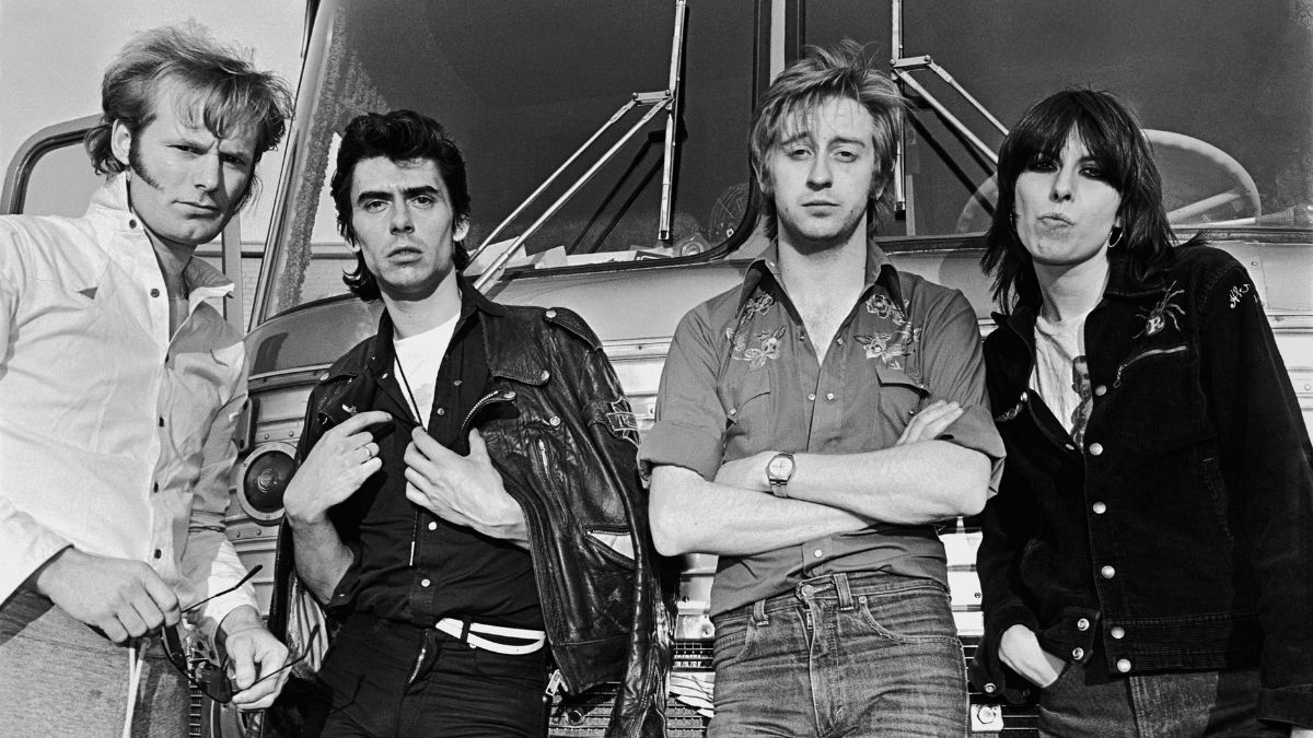 The British rock band The Pretenders pose in front of their tour bus during their first American 1980 concert tour stop in Nashville, Tennessee.