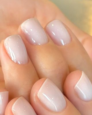 Squoval milky sheer white nails