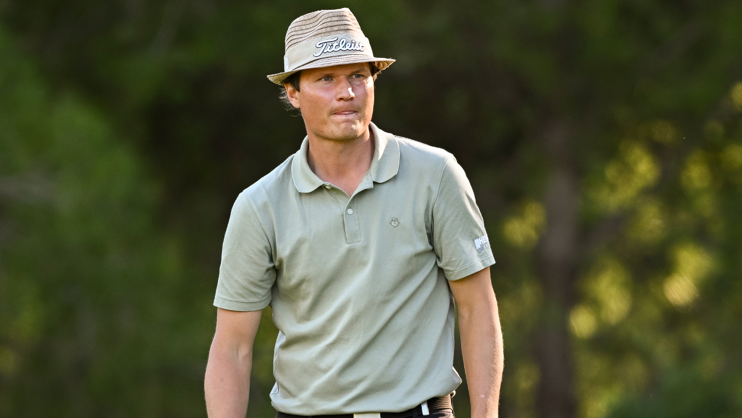 Tapio Pulkkanen watches a shot