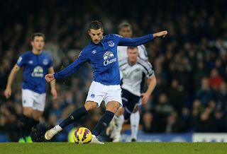 Kevin Mirallas of Everton takes a penalty kick but misses (Photo by AMA/Corbis via Getty Images)