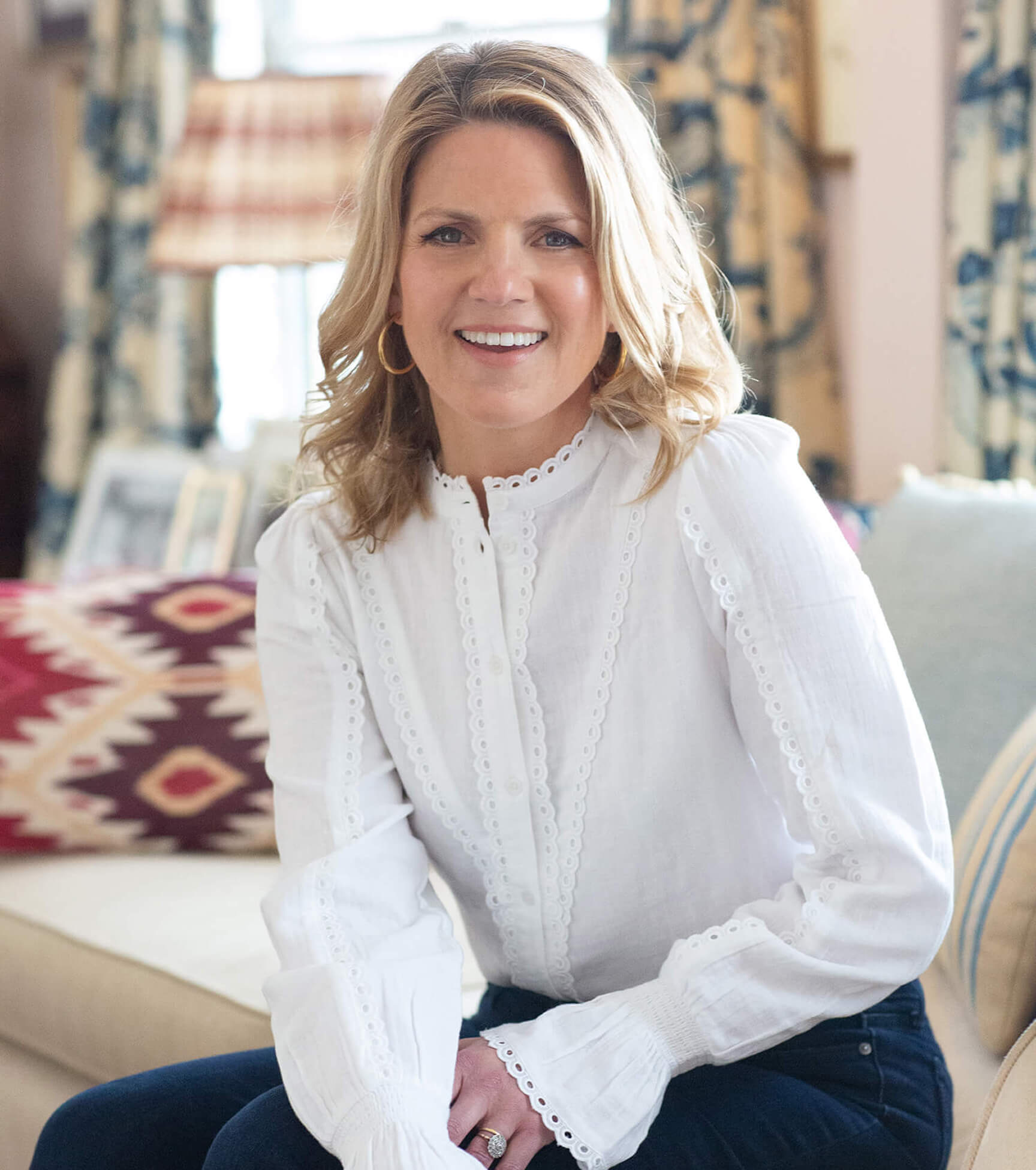 Emma Sherlock, interior designer and founder, sitting for a headshot