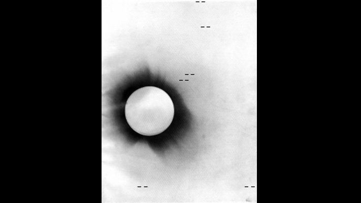 Negative photo of the 1919 solar eclipse taken from Príncipe Island. The position of the stars that were examined in the historic test of Einstein&#039;s theory of gravity are marked in this photo.