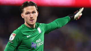 Preston North End goalkeeper Freddie Woodman gestures with his hand during the Championship match between Huddersfield Town and Preston North End on 18 October, 2022 at the John Smith's Stadium in Huddersfield, United Kingdom.