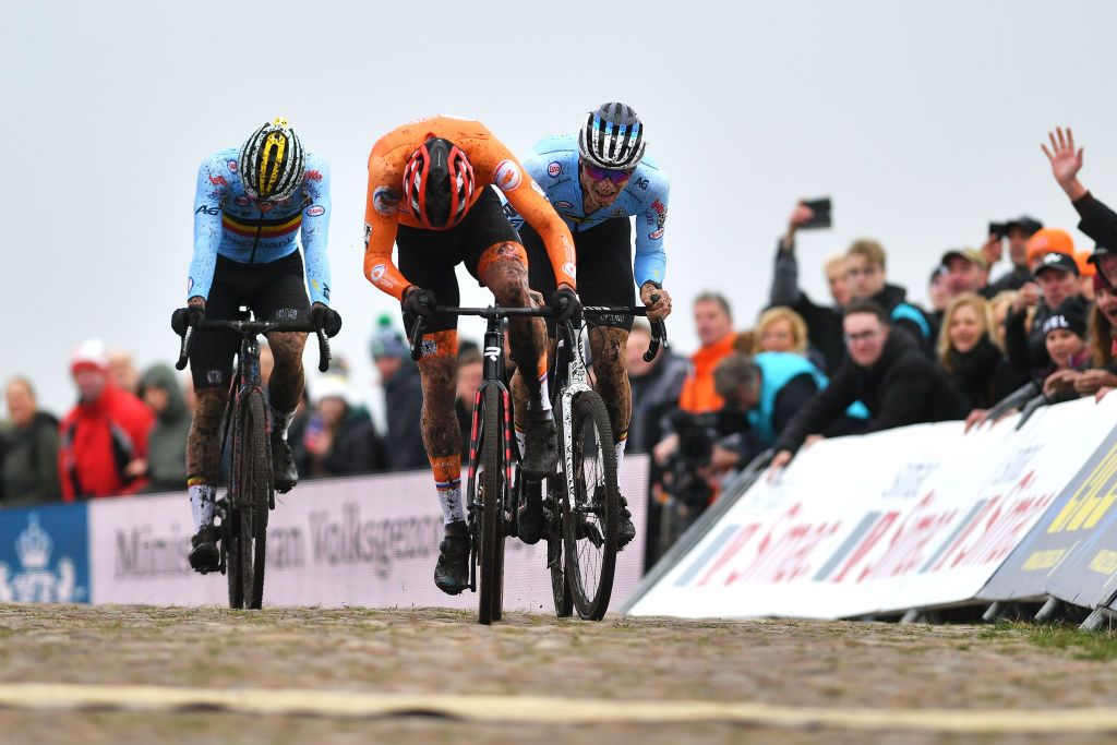COL DU VAM DRENTHE NETHERLANDS NOVEMBER 06 LR Thibau Nys of Belgium Ryan Kamp of Netherlands and Niels Vandeputte of Belgium sprint at finish line during the 19th UEC European Cyclocross Championships 2021 Mens U23 EuroCross21 UECcycling on November 06 2021 in Col du Vam Drenthe Netherlands Photo by Luc ClaessenGetty Images