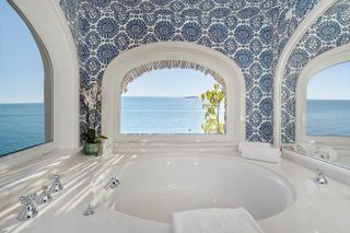 at Il San Pietro, Positano bathroom with a view of the sea