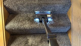 The Shark Cordless PowerDetect tackling the stairs