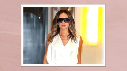 Victoria Beckham pictured with a wavy, blowout hairstyle whilst wearing sunglasses and a white shirt on October 13, 2022 in New York City/ in a pink textured template