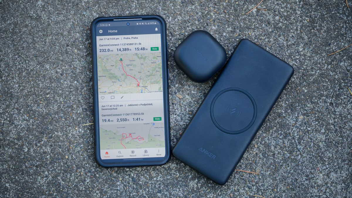 Samsung S23+ phone, Samsung headphones, and an Anker power bank