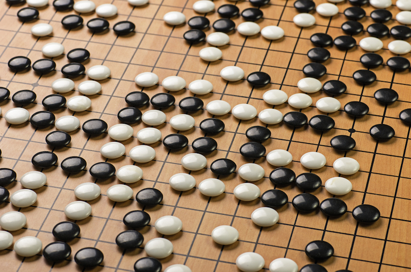 Google artificial intelligence beats champion at world's most complicated  board game