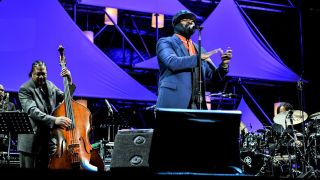 James Genus (L) and Gregory Porter perform on stage at the 2014 International Jazz Day Global Concert on April 30, 2014 in Osaka, Japan