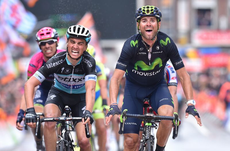 Alejandro Valverde (Movistar) about to raise his arms in triumph as Julian Alaphilippe (Etixx-Quick Step) curses his second place