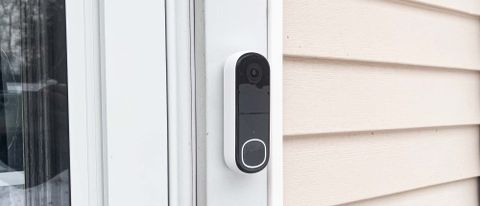Arlo Video Doorbell 2K attached to house