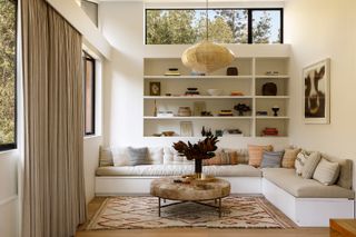 White living room with built in storage