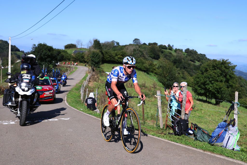 LACRUZDELINARES SPAIN SEPTEMBER 14 Remco Evenepoel of Belgium and Team Soudal Quick Step Polka dot Mountain Jersey competes in the breakaway climbing to the Puerto de la Cruz de Linares 840m during the 78th Tour of Spain 2023 Stage 18 a 1789km stage from Pola de Allande to La Cruz de Linares 840m UCIWT on September 14 2023 in La Cruz de Linares Spain Photo by Alexander HassensteinGetty Images