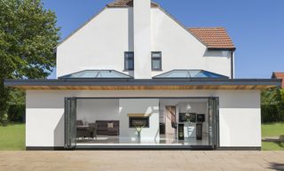 The exterior of a home with stunning roof lanterns from Korniche