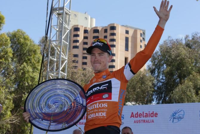 Rohan Dennis (BMC) in the leader's jersey with the prize for overall winner