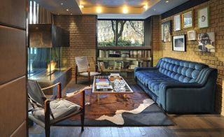 Living room with a sofa and a fireplace