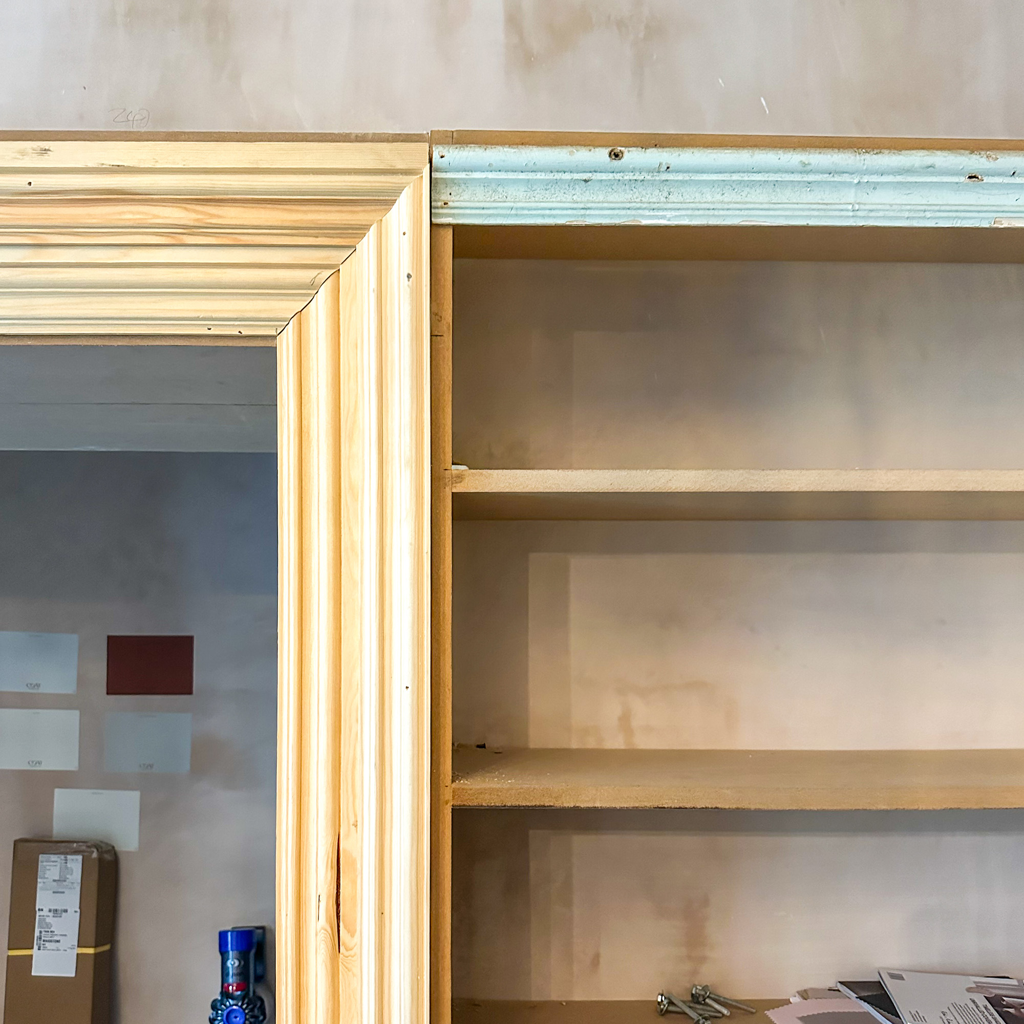 bookshelves mid renovation with wonky joinery