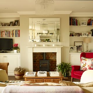 white and cranberry living room with fireplace