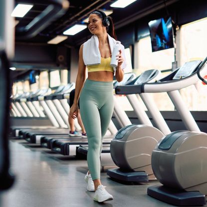 A woman doing one of the best walking workouts for beginners