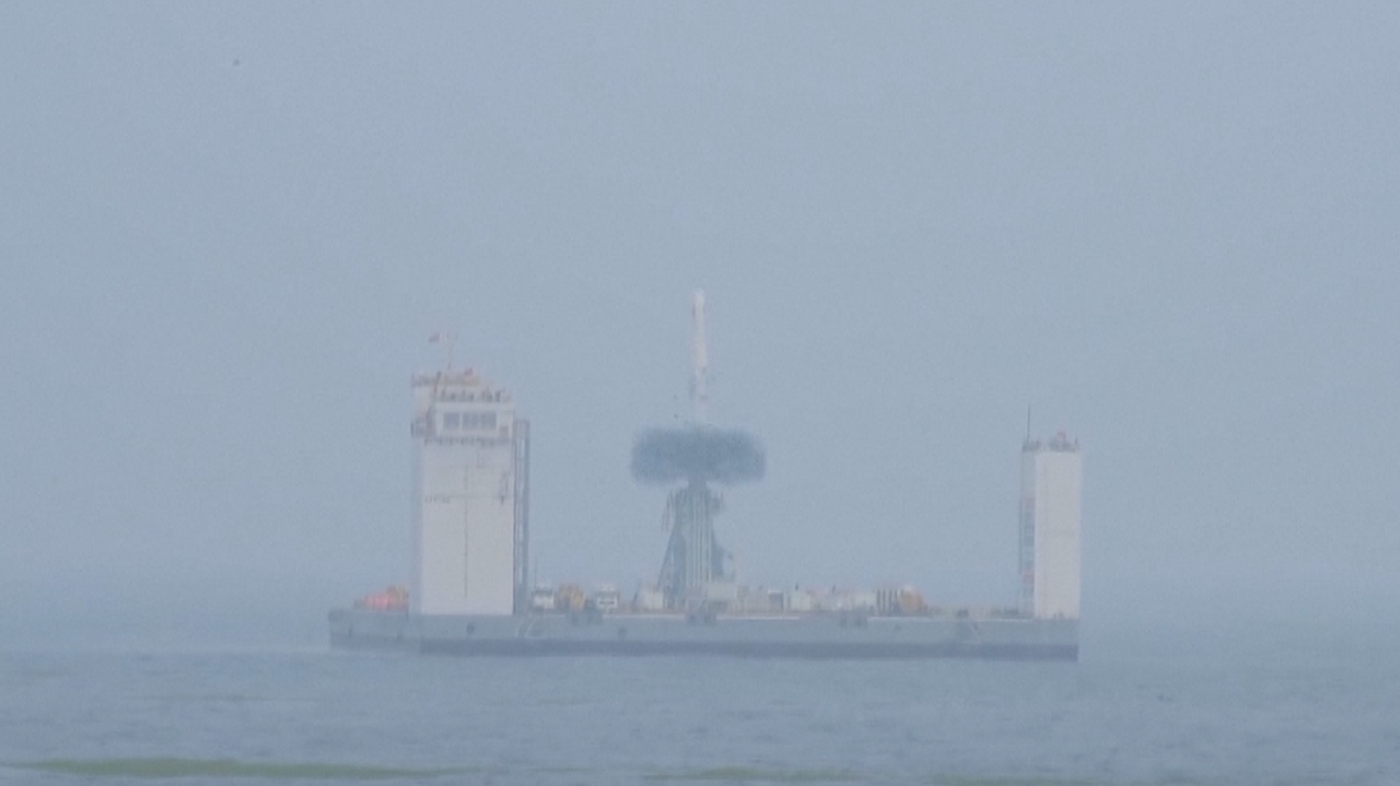 China's Long March 11 rocket lifts off from a mobile launch platform in the Yellow Sea on June 5, 2019.