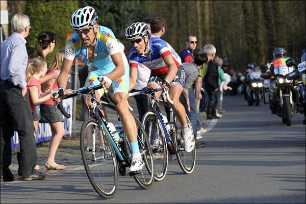 Dmitriy Muravyev (Astana) and Sylvain Chavanel (Omega Pharma-Quickstep) in a late race break.