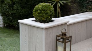 Millboard composite decking used to clad stairs and planters.