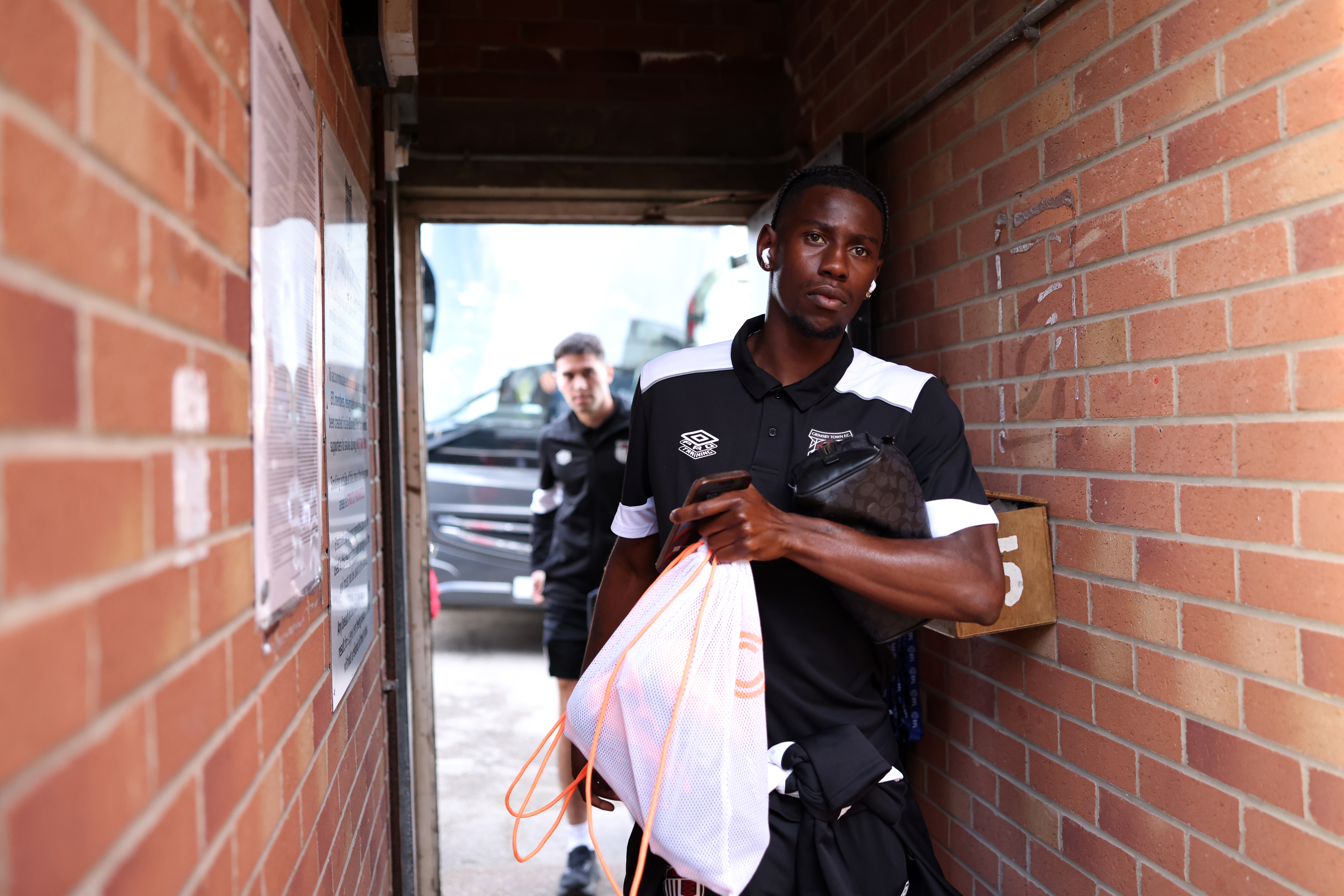 Clarke Oduor arriving at Blundell Park for the fixture