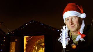 Prince Harry in a Christmas hat