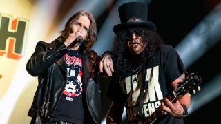 Slash and Myles Kennedy onstage in 2024