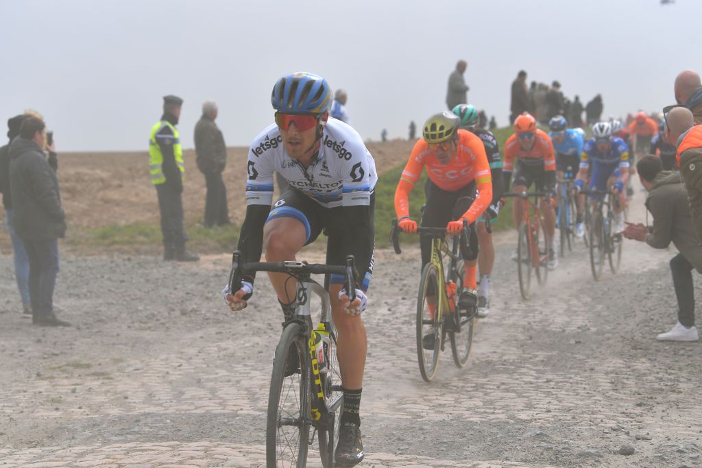 Matteo Trentin leads Greg Van Avermaet over the cobbles