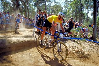Cadel Evans rides for Australia on home turf in the cross-country mountain bike event at the 2000 Sydney Olympic Games