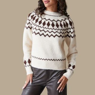 flat lay image of woman wearing a jumper