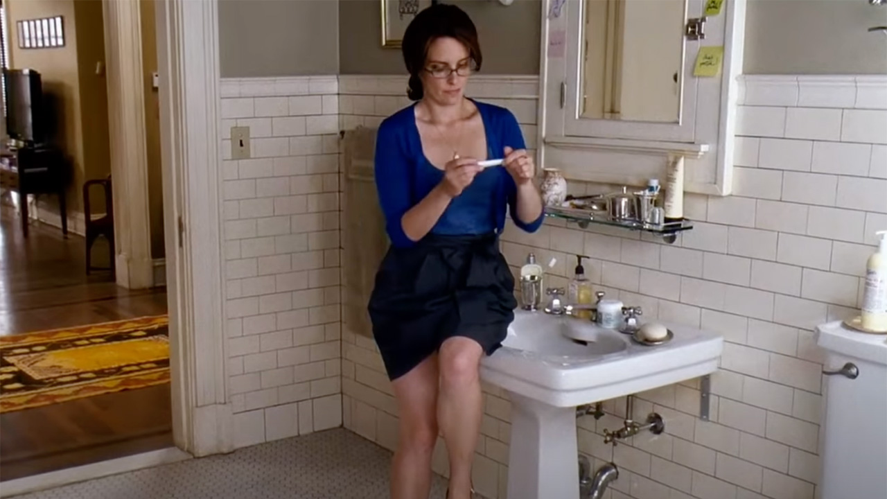 Tina Fey taking a pregnancy test in Baby Mama.