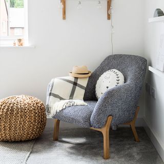 scandi accent chair with grey flooring